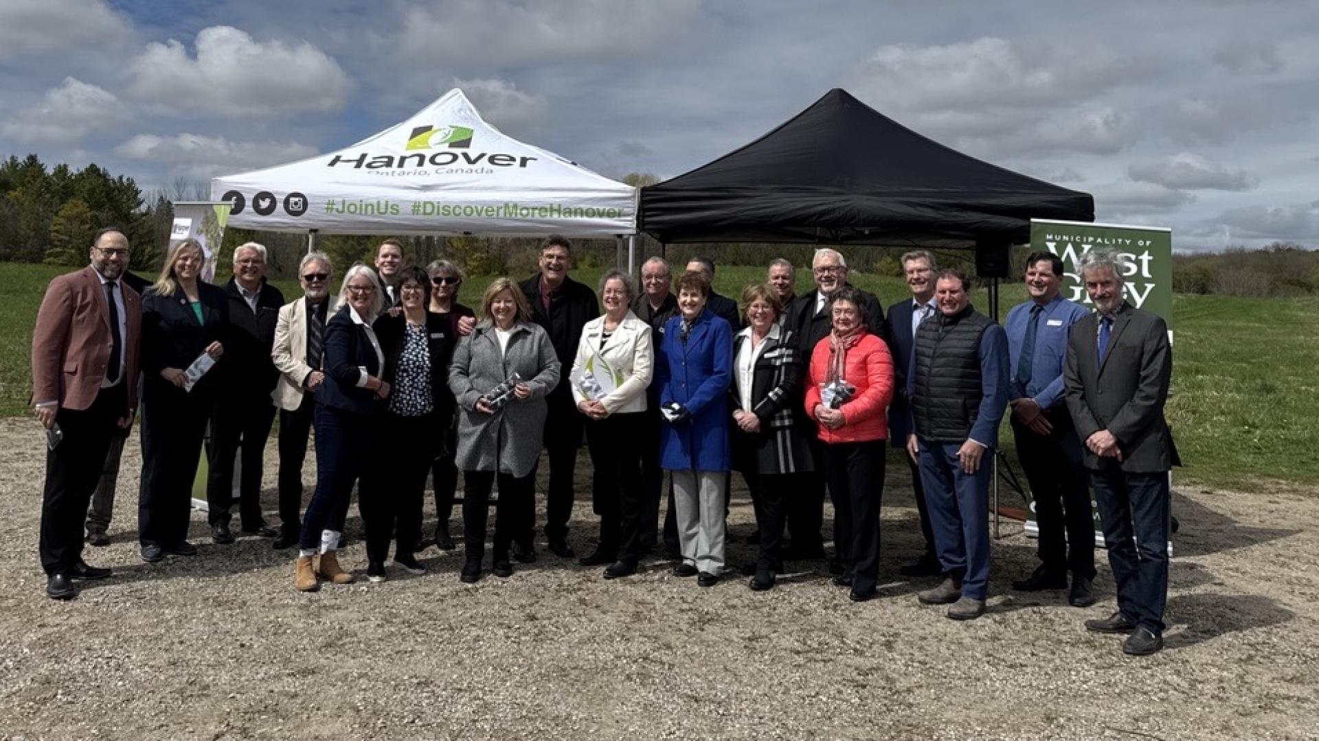 Council and members of parliament from West Grey and Town of Hanover outside by tents